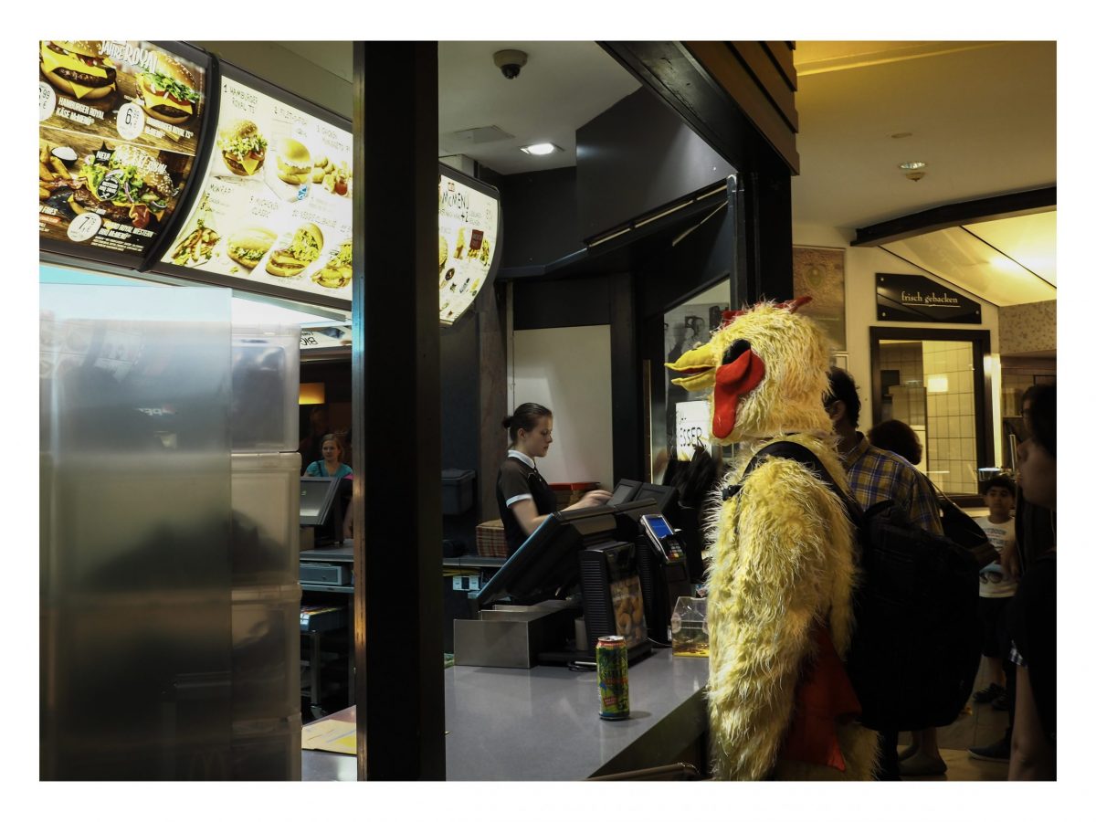 Chicken costume at mac donalds How to catch the moment